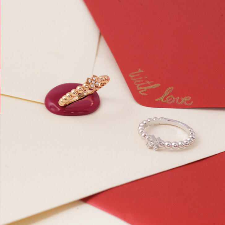 Bron Joy X Ring 750 Roségold mit weißen Brillanten