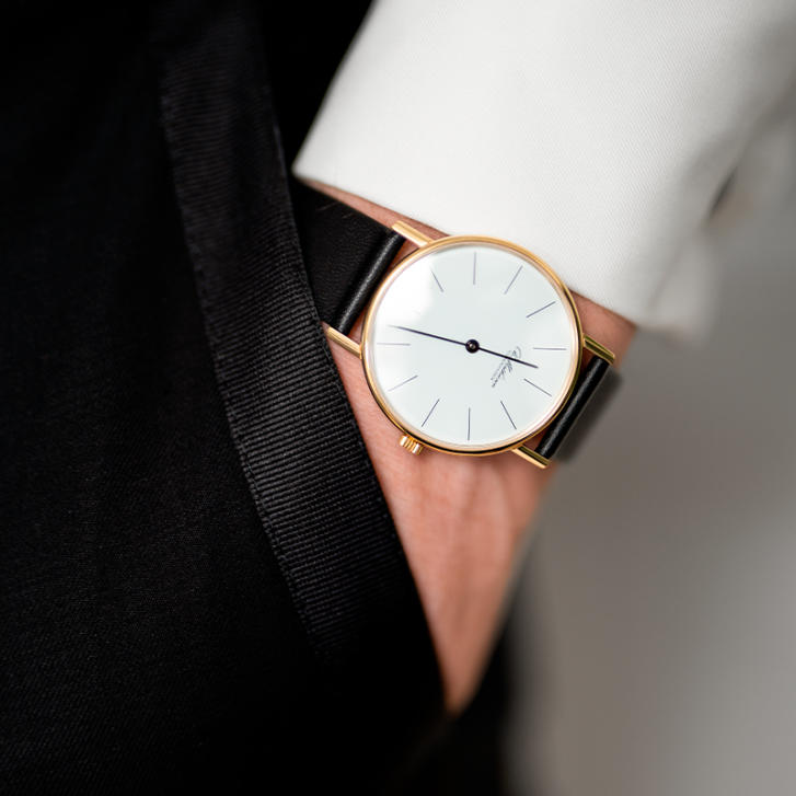 Ole Mathiesen Herren Armbanduhr Ø 33 mm vergoldet